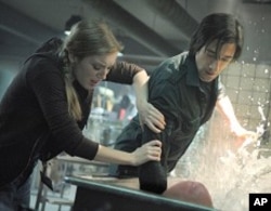 SARAH POLLEY as Elsa Kast and ADRIEN BRODY as Clive Nicoli in Warner Bros. Pictures’ and Dark Castle Entertainment’s science fiction thriller “SPLICE,” a Warner Bros. Pictures release.
