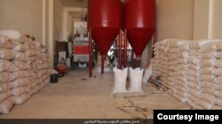 FILE - Islamic State runs this flour mill in a village near Deir Ezzor in eastern Syria, Oct. 18, 2016. (Credit: Dawa al-Haq)