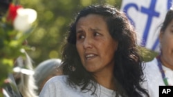 Jeanette Vizguerra, a Mexican immigrant who has lived in a church to avoid immigration authorities for the past three months, speaks after leaving the church, May 12, 2017, in downtown Denver. Vizguerra won a two-year deportation delay.