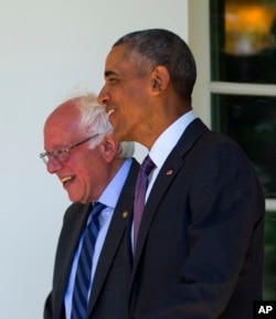 President Barack Obama walks with Democratic presidential candidate Sen. Bernie Sanders of Vermont down the Colonnade of the White House in Washington, June 9, 2016.