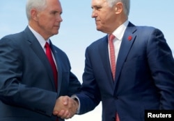 U.S. Vice President Mike Pence (left) shakes hands with Australia's Prime Minister Malcolm Turnbull after a media conference at Admiralty House in Sydney, Australia, April 22, 2017.