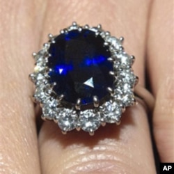 Kate Middleton wears her engagement ring which once belonged to Diana, Princess of Wales, on the day her engagement to Prince William was announced in London Tuesday Nov.16, 2010.
