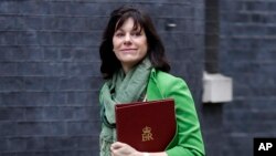British Business Minister Claire Perry arrives to attend a Cabinet meeting at Downing Street in London, Jan. 15, 2019.