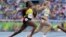 Jamaica's Elaine Thompson, left, and Germany's Gina Luckenkemper compete in a women's 200-meter heat during the athletics competitions of the 2016 Summer Olympics at the Olympic stadium in Rio de Janeiro, Brazil, Aug. 15, 2016. 