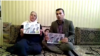Ameneh Ghaderi, mother of detained Iranian Kurdish activist Zaniar Moradi, and Amjad Hossein Panahi, brother of detained Iranian Kurdish activist, Ramin Hossein Panahi, make a statement from Marivan, Iran, on September 7, 2018.