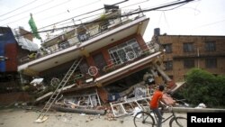 Une maison détruite à Katmandou (Reuters)