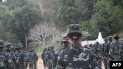 This handout photo from local media group Kantarawaddy Times taken on May 10, 2021, and released on June 4 shows military training conducted by the Karenni National Progressive Party ethnic rebel group in Kayah state, Myanmar.. 