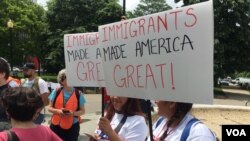 Protesters gather in Washington, D.C., on May Day to stand against President Donald Trump's policies on immigration. (A. Barros/VOA)