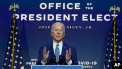President-elect Joe Biden speaks at The Queen theater, Monday, Nov. 9, 2020, in Wilmington, Del. (AP Photo/Carolyn Kaster)