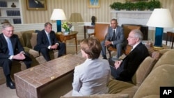 President Barack Obama meets with congressional leaders in the Oval Office of the White House, Washington, June 18, 2014.