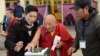 FILE - Palden Gyatso is guided as he casts his vote to elect a sikyong (prime minister) of the Central Tibetan Administration and lawmakers in McLeod Ganj, India, March 20, 2016. The Tibetan monk died Nov. 30, 2018, in Dharamsala, India, at age 85.