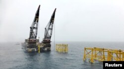 FILE - Norway is a big oil producer. Now it wants to mine minerals from the seabed. A view of Equinor's oil platform in Johan Sverdrup oilfield in the North Sea, Norway August 22, 2018. (REUTERS/Nerijus Adomaitis/File Photo)