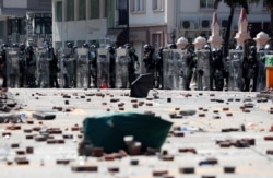 Riot police officers stand during clashes with protesters outside Hong Kong Polytechnic University (PolyU) in Hong Kong, China November 17, 2019. REUTERS/Adnan Abidi