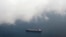 FILE - A tanker travels through the Singapore Strait.