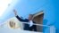 President Barack Obama waves as he boards Air Force One, June 29, 2016, at Andrews Air Force Base, Md. 