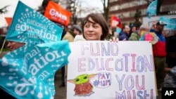 Striking teachers are seen at a demonstration in Manchester, England, Feb. 1, 2023. 