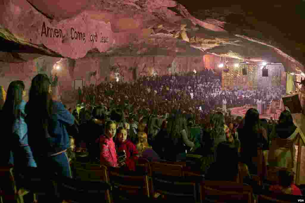 Entire families attend Mass on Christmas Eve, which for Coptic Christians falls on January 6th. (Hamada Elrasam/VOA)