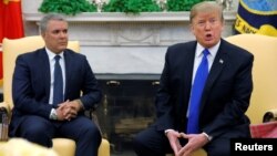 Presiden AS Donald Trump (kanan) dan Presiden Kolombia Ivan Duque dalam pertemuan di Gedung Putih, Rabu (13/2). 