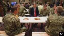 British Defense Secretary Philip Hammond during visit to temporary Army barracks, east London, July 20, 2012.