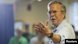 Republican presidential candidate Jeb Bush answers a question from the audience during a town hall campaign stop at the VFW Post in Hudson, New Hampshire, July 8, 2015.