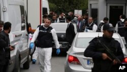 Turkish police gather outside the residence of the Saudi consul General Mohammed al-Otaibi to conduct a search after the disappearance and alleged slaying of writer Jamal Khashoggi, in Istanbul, Oct. 17, 2018.