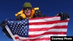 Vanessa O'Brien arrives at the summit of K-2, the world's second highest mountain, in Pakistan, July 28, 2017. (Photo: courtesy Vanessa O'Brien)
