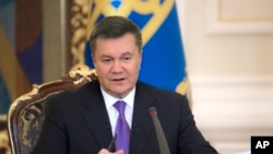 FILE - Ukrainian President Viktor Yanukovych speaks during a press conference in Kyiv.