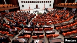 FILE - Members of the Turkish Parliament convene in Ankara, March 19, 2014. 