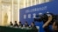 FILE - Chinese officials answer questions about a law regulating overseas non-governmental organizations (NGOs) during a press conference at the Great Hall of the People in Beijing, China, April 28, 2016. 