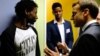 Le président français Emmanuel Macron parle à Ahmed Adam, originaire du Soudan, à Croissiles, le 16 janvier 2018.