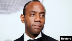 FILE - NAACP President Cornell William Brooks poses backstage during the 47th NAACP Image Awards in Pasadena, California, Feb. 5, 2016.