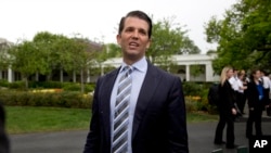 FILE - Donald Trump Jr., son of President Donald Trump, speaks to media on the South Lawn of the White House in Washington, April,17, 2017.
