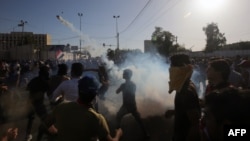 Protes anti-pemerintah di Baghdad, Irak meledak menjadi kekerasan Jumat sore (20/5).