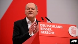 Канцлер Німеччини Олаф Шольц під час конгресу своєї соціал-демократичної партії SPD у Берліні: «Якщо буде необхідно, Німеччина повинна мати можливість зробити ще більший внесок» 9 грудня 2023 року. (Фото Tobias SCHWARZ / AFP)