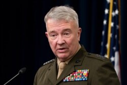 FILE - Gen. Kenneth McKenzie, Jr., commander of the United States Central Command, speaks during a briefing at the Pentagon, outside Washington, April 22, 2021.