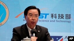 Taiwan's Foreign Minister Joseph Wu speaks during a press conference with American Institute in Taiwan director Brent Christensen, in Taipei, Nov. 21, 2020.