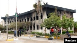 The electoral commission building after a suicide attack in Tripoli, Libya, May 2, 2018. 