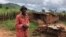 One of the farmers, 71-year old King Maposa, is seen at Manzou farm in Mazowe district, Zimbabwe, March 2, 2018, near what he now calls his bedroom, one that he has to crawl into. He says it has been three years of stress. (S. Mhofu/VOA)