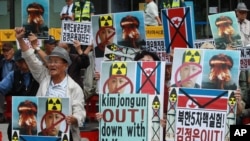 韩国抗议者在首尔举行示威集会，谴责朝鲜举行的最新一起核试验。（2016年9月10日）