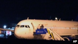 Syrian passenger plane that was forced by Turkish jets to land at Esenboga airport in Ankara, Turkey, Oct. 10, 2012