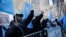 Uighurs and their supporters protest in front of the Permanent Mission of China to the United Nations in New York, March 15, 2018. Uighur Muslims protested a sweeping Chinese surveillance and security campaign that has sent thousands to detention camps.