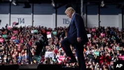 Le président Donald Trump, lors d'un meeting de campagne à Battle Creek, Michigan, le 18 décembre 2019.