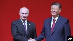 شی جینپینگ، رییس جمهور چین و ولادیمیر پوتین، رییس جمهور روسیه