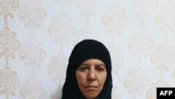This handout undated picture taken and released by the press service of the Turkish Government, shows Rasmiya Awad, believed to be the sister of slain Islamic State leader Abu Bakr al-Baghdadi, at an unknown location.