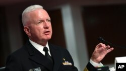 FILE - Adm. Brett Giroir, director of the U.S. coronavirus diagnostic testing, testifies at a Senate committee hearing, on Capitol Hill, in Washington, June 30, 2020.