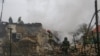 Firefighters work at the site where residential buildings were damaged by a Russian missile strike, amid Russia's attack on Ukraine, in Odesa, Ukraine April 20, 2024.