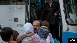 სირიელ რეპატრიანტებს გუდაუთაში ხვდებიან