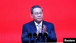 FILE - Chinese Premier Li Qiang, shown at the opening ceremony of China Development Forum 2024, in Beijing March 24, will represent China at the upcoming trilateral forum.