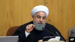 Presiden Iran Hassan Rouhani memberikan sambutan dalam sidang kabinet di Teheran, Iran, 31 Desember 2017. (Foto: Kantor Presiden Iran via AP)