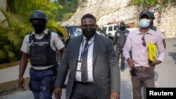 Carl Henry Destin, a Haitian justice of the peace, leaves the residence of late President Jovenel Moise after FBI agents assisted with investigations inside the property in Port-au-Prince, Haiti, July 15, 2021.